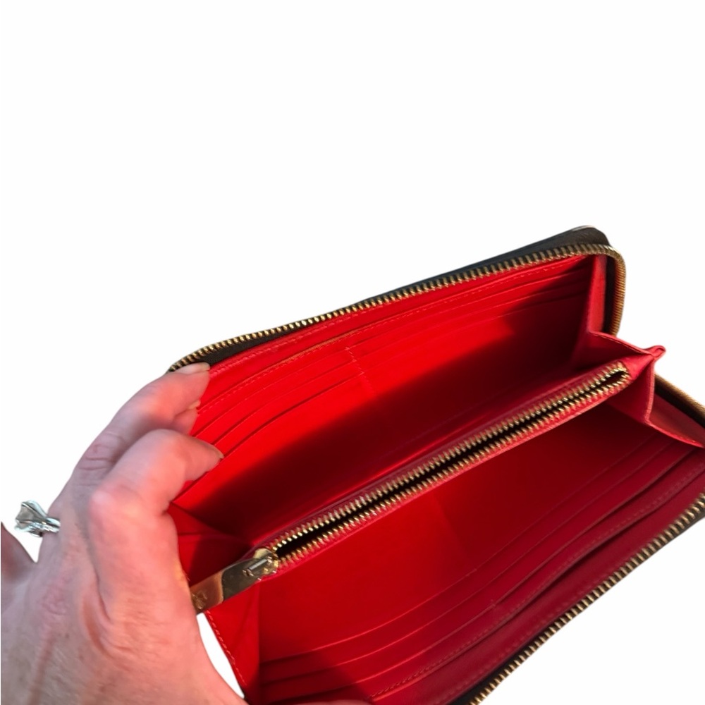 Christian Louboutin Panettone Black Studded Zip Wallet
Gold studs, red inside - Picture 4 of 7
